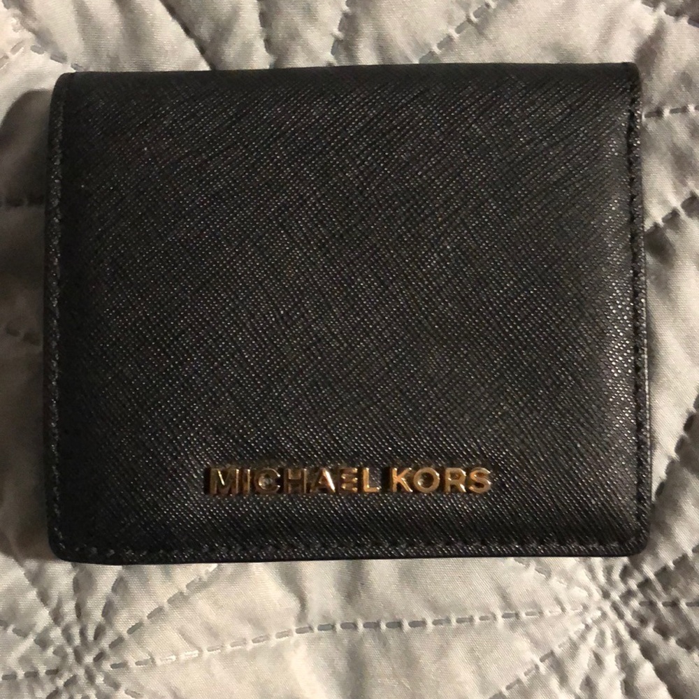 Black MK wallet with gold hardware